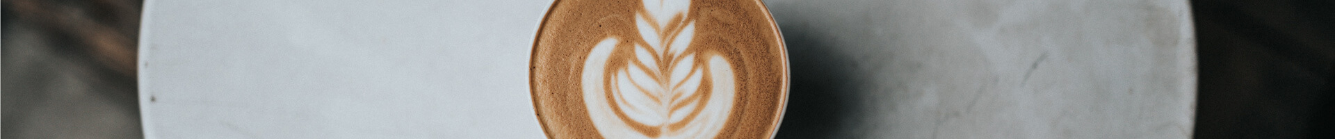 Latte art in a cup, viewed from above.